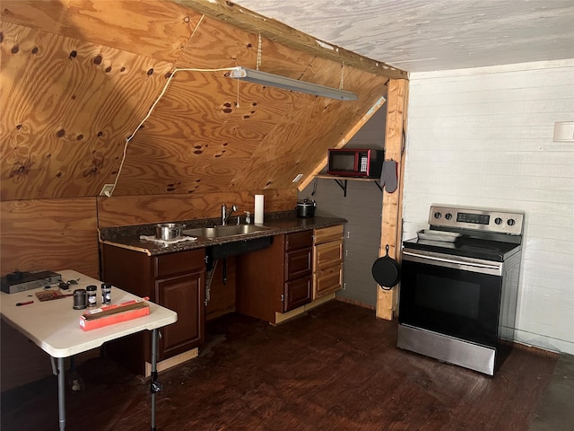 3052 Vz County Road 3810, Wills Point, TX 75169 - kitchen with stainless steel range with electric cooktop, a sink, black microwave, dark wood-type flooring, and dark countertops
