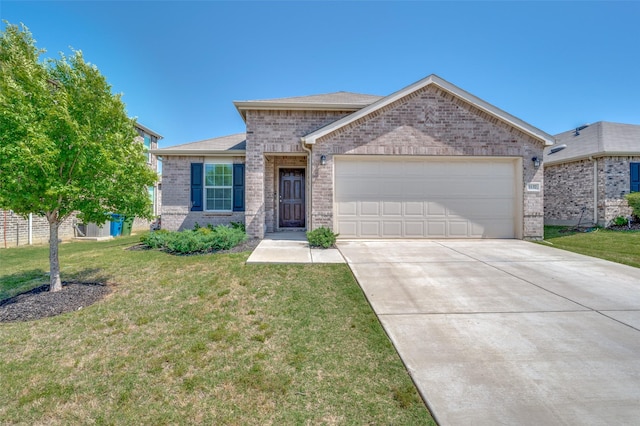 1137 Vernon Dr, Aubrey, TX 76227 - view of front of house featuring brick siding, an attached garage, driveway, and a front lawn
