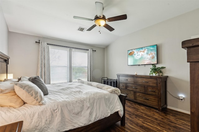 202 Freedom Trl, Forney, TX 75126 - bedroom with dark wood finished floors, lofted ceiling, baseboards, and ceiling fan