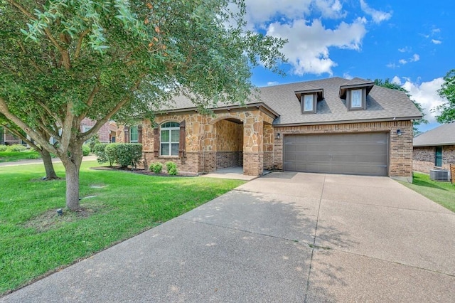 17015 Salado Dr, Woodway, TX 76712 - view of front of property with brick siding, concrete driveway, a front lawn, a garage, and cooling unit