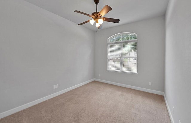 17015 Salado Dr, Woodway, TX 76712 - empty room with light colored carpet, baseboards, and a ceiling fan