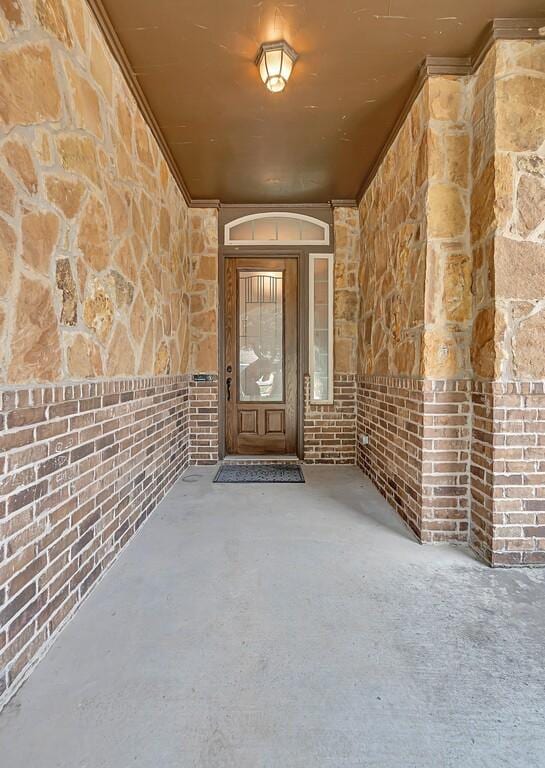 17015 Salado Dr, Woodway, TX 76712 - property entrance featuring stone siding and brick siding