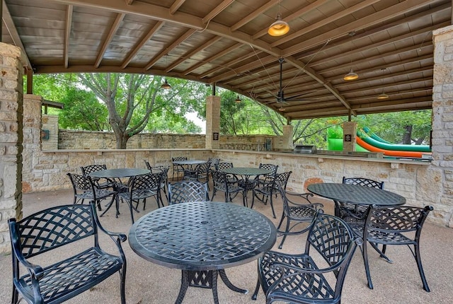 17015 Salado Dr, Woodway, TX 76712 - view of patio with outdoor dining space and fence