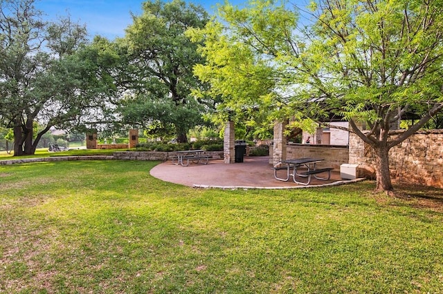 17015 Salado Dr, Woodway, TX 76712 - view of grassy yard with a patio area