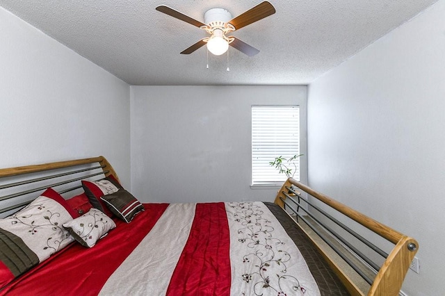 918 Telluride Dr, Arlington, TX 76001 - bedroom with a textured ceiling and ceiling fan