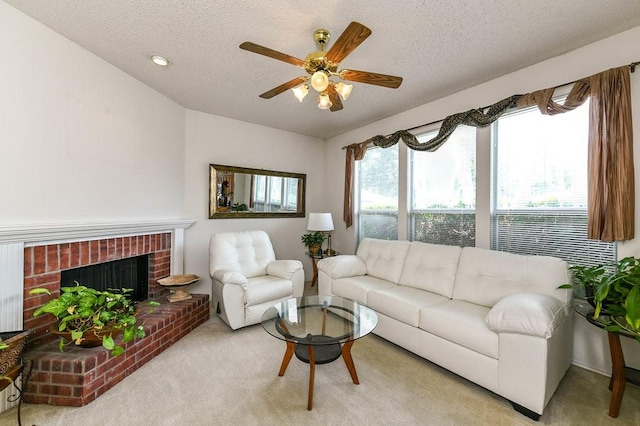 918 Telluride Dr, Arlington, TX 76001 - carpeted living area with ceiling fan, a brick fireplace, and a textured ceiling
