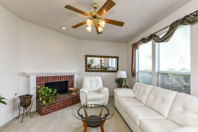 918 Telluride Dr, Arlington, TX 76001 - living area featuring carpet flooring, a ceiling fan, a textured ceiling, and a fireplace