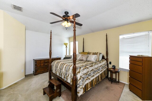 918 Telluride Dr, Arlington, TX 76001 - bedroom with light colored carpet, baseboards, and ceiling fan
