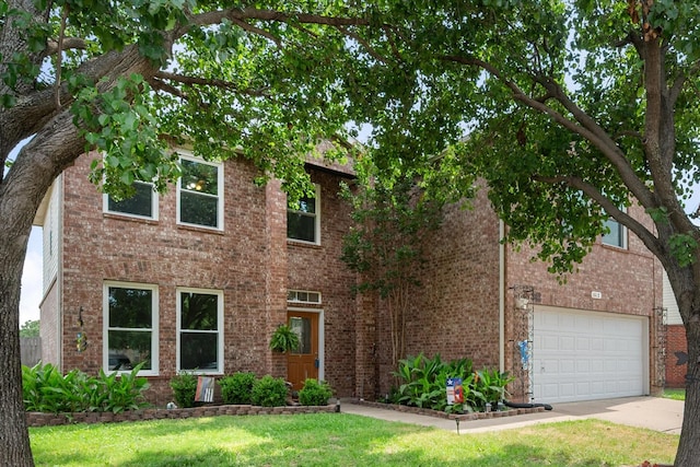 1612 Marble Cove Ln, Denton, TX 76210 - view of front of home featuring concrete driveway, brick siding, a garage, and a front lawn