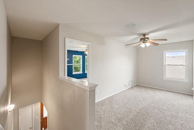 1612 Marble Cove Ln, Denton, TX 76210 - unfurnished room with ceiling fan, carpet flooring, and baseboards