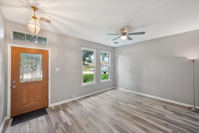 1612 Marble Cove Ln, Denton, TX 76210 - foyer entrance with light wood-style floors, baseboards, and a ceiling fan