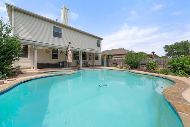 1612 Marble Cove Ln, Denton, TX 76210 - view of pool featuring fence, a pool with connected hot tub, and a patio