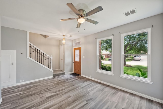 1612 Marble Cove Ln, Denton, TX 76210 - foyer entrance with wood finished floors, stairway, and baseboards