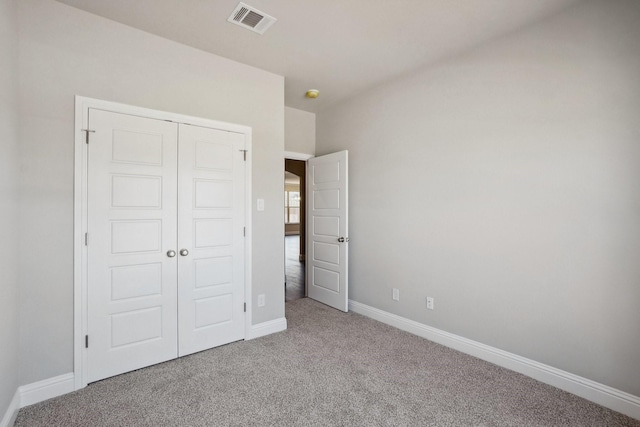 709 Lake Murray Ln, Cleburne, TX 76033 - unfurnished bedroom with carpet flooring, a closet, and baseboards
