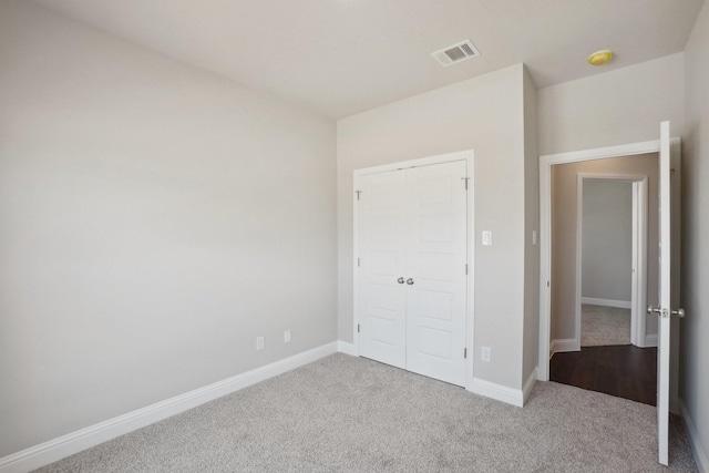 709 Lake Murray Ln, Cleburne, TX 76033 - unfurnished bedroom featuring carpet floors, a closet, and baseboards