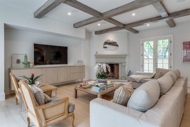 living room with light wood-style floors, beam ceiling, coffered ceiling, a fireplace, and recessed lighting