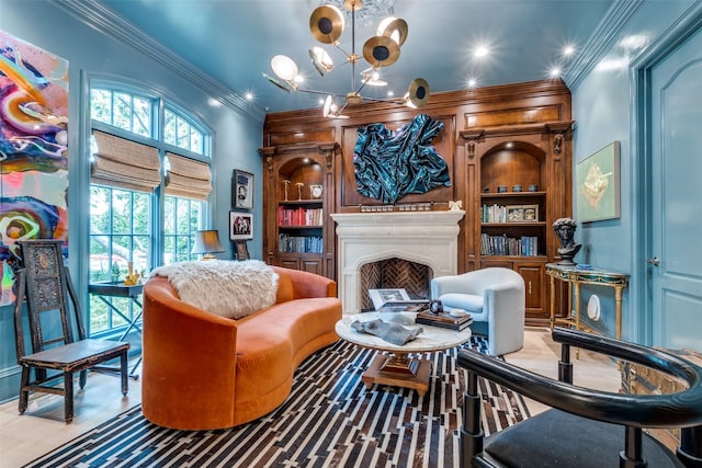 living area featuring built in shelves, crown molding, a fireplace, a chandelier, and recessed lighting