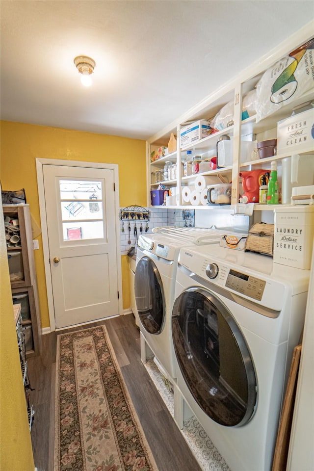 831 Plum St, Graham, TX 76450 - laundry area with separate washer and dryer and dark wood-style flooring