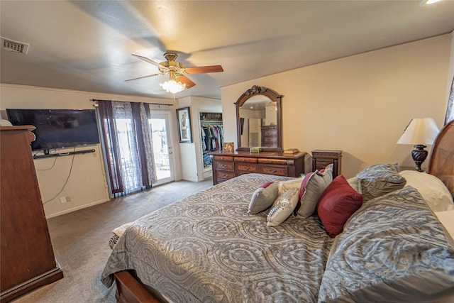 831 Plum St, Graham, TX 76450 - bedroom featuring carpet floors, baseboards, a ceiling fan, access to exterior, and a closet