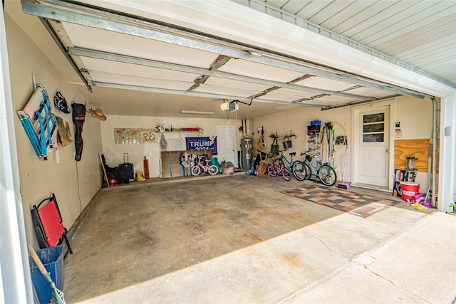 831 Plum St, Graham, TX 76450 - garage featuring a garage door opener
