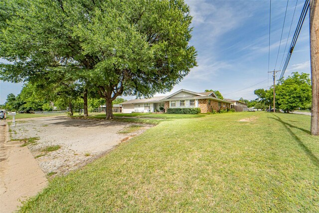 831 Plum St, Graham, TX 76450 - view of grassy yard