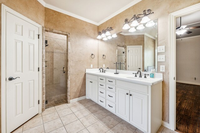 109 Rio Bravo Ct, Weatherford, TX 76088 - full bath featuring crown molding, a stall shower, double vanity, baseboards, and ceiling fan