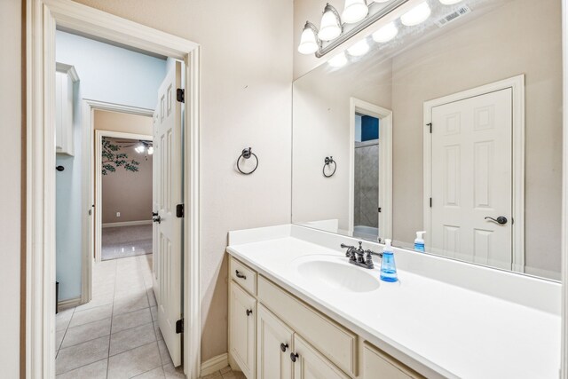 109 Rio Bravo Ct, Weatherford, TX 76088 - bathroom featuring tile patterned floors, vanity, and baseboards