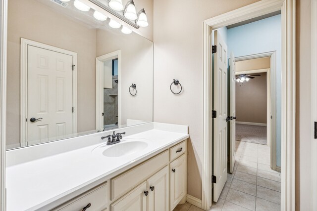 109 Rio Bravo Ct, Weatherford, TX 76088 - bathroom with tile patterned floors, vanity, and baseboards