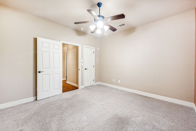 109 Rio Bravo Ct, Weatherford, TX 76088 - unfurnished bedroom with carpet flooring, baseboards, and ceiling fan