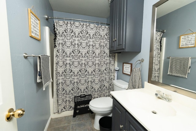809 Oak Dr, Ennis, TX 75119 - bathroom with toilet, vanity, curtained shower, and tile patterned flooring