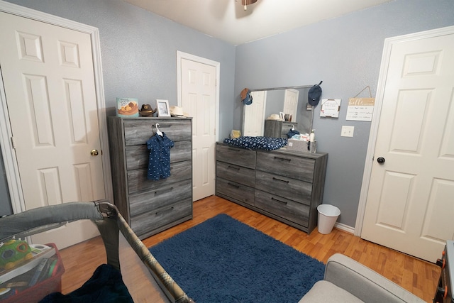 809 Oak Dr, Ennis, TX 75119 - bedroom with light wood-style floors