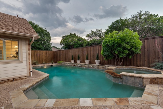 3824 Wyeth Dr, Plano, TX 75023 - view of swimming pool featuring a fenced backyard and a pool with connected hot tub