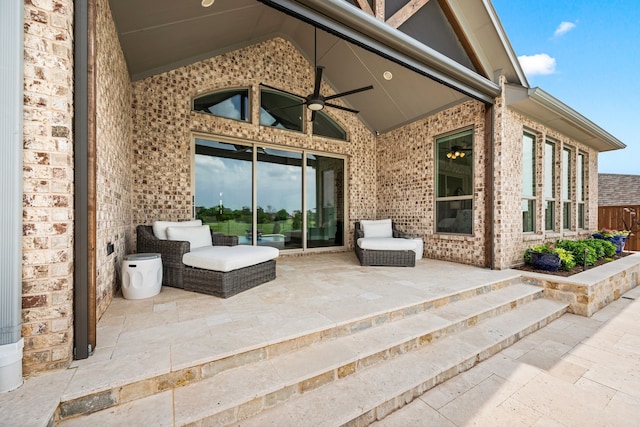 view of patio featuring ceiling fan