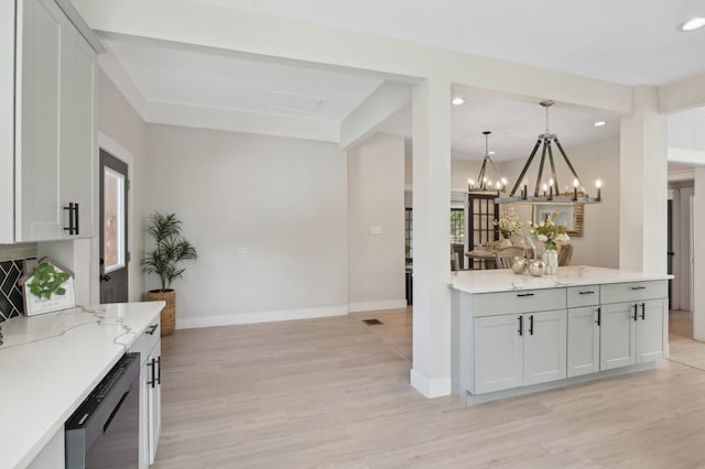 702 Griffith, Terrell, TX 75160 - kitchen with dishwashing machine, light wood-type flooring, baseboards, light stone counters, and recessed lighting