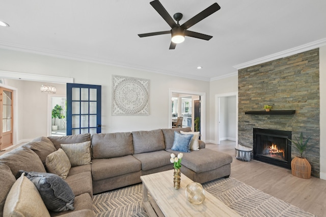 702 Griffith, Terrell, TX 75160 - living area featuring crown molding, recessed lighting, a ceiling fan, a fireplace, and wood finished floors