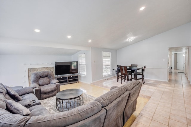 3110 Nutmeg Ln, Garland, TX 75044 - living room with vaulted ceiling, recessed lighting, light tile patterned flooring, and baseboards