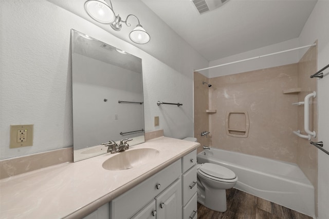 1812 Trinity Dr, Waco, TX 76710 - full bathroom with wood finished floors, bathing tub / shower combination, toilet, and vanity