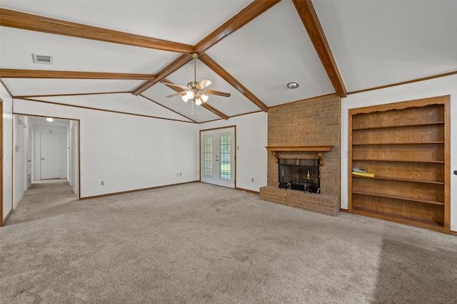 1812 Trinity Dr, Waco, TX 76710 - unfurnished living room with a ceiling fan, carpet, a brick fireplace, baseboards, and built in features