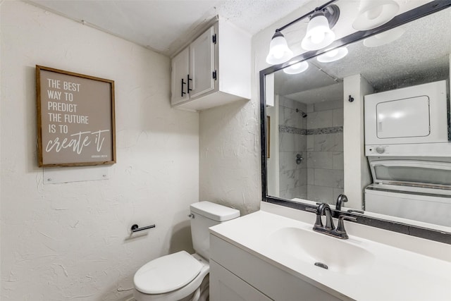 2301 Balsam Dr Unit F308, Arlington, TX 76006 - bathroom with stacked washer / drying machine, a textured wall, toilet, a shower, and vanity