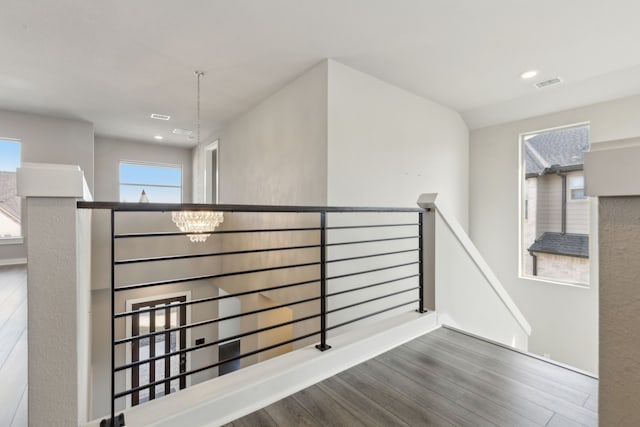 3967 Sanders Dr, Celina, TX 75009 - stairs featuring wood finished floors, baseboards, recessed lighting, and a chandelier