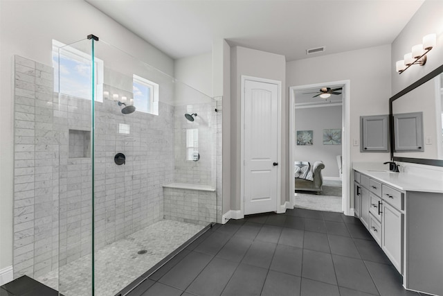 1318 Middleton Dr, Rockwall, TX 75087 - ensuite bathroom with tile patterned floors, a ceiling fan, a walk in shower, vanity, and baseboards
