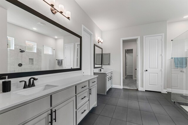 1318 Middleton Dr, Rockwall, TX 75087 - full bathroom with walk in shower, tile patterned floors, vanity, baseboards, and recessed lighting