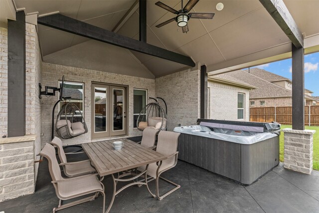 1318 Middleton Dr, Rockwall, TX 75087 - view of patio featuring french doors, a hot tub, fence, ceiling fan, and outdoor dining area