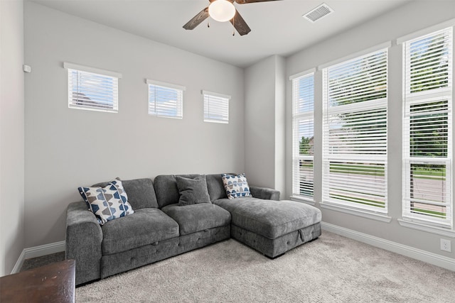 1318 Middleton Dr, Rockwall, TX 75087 - living room with a ceiling fan, baseboards, plenty of natural light, and carpet floors