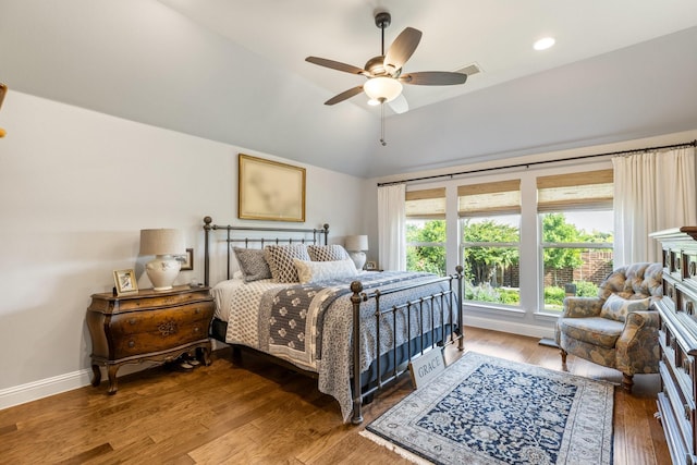 821 Mildren Ln, Fate, TX 75087 - bedroom with lofted ceiling, wood finished floors, baseboards, and a ceiling fan