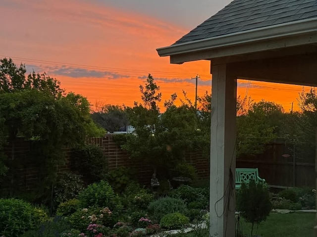 821 Mildren Ln, Fate, TX 75087 - view of yard at dusk