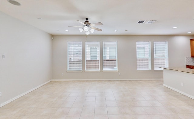 6407 Capulet Pl, Dallas, TX 75252 - empty room featuring ceiling fan, recessed lighting, and light tile patterned flooring