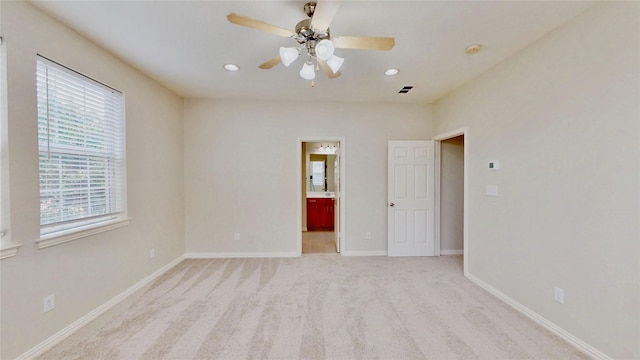 6407 Capulet Pl, Dallas, TX 75252 - unfurnished bedroom with light colored carpet, recessed lighting, connected bathroom, and a ceiling fan