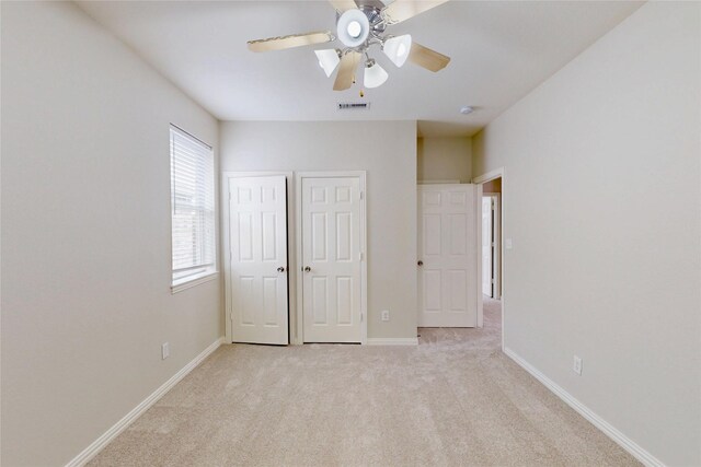6407 Capulet Pl, Dallas, TX 75252 - unfurnished bedroom featuring light carpet and ceiling fan