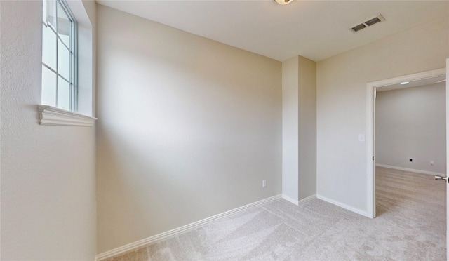 6407 Capulet Pl, Dallas, TX 75252 - spare room featuring light carpet and baseboards